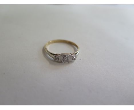 A 9ct gold three stone diamond ring, size R, approx 1.9 grams, diamonds  bright, some general usage marks 