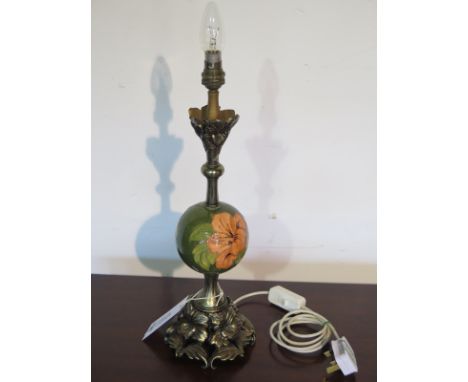 A Moorcroft table lamp, tested and working, in good condition, 46cm tall 
