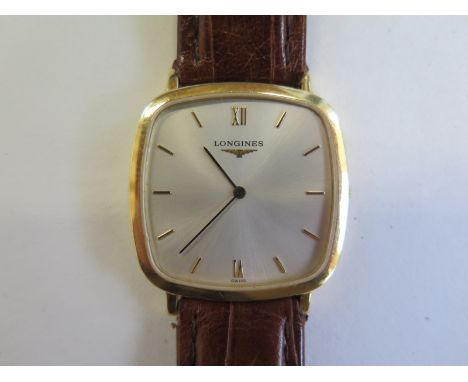 An 18ct yellow gold Longines gents 2006 Quartz wristwatch - 31mm wide, including button - model L4.712.6.75.2 case no 32.451.