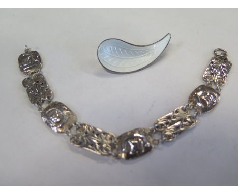 A silver Viking ship bracelet hallmarked Edinburgh 1937 by Shipton &amp; co - and a Norwegian silver gilt and enamel brooch m