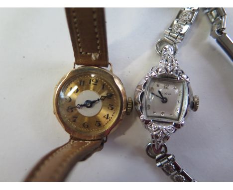 A 9ct yellow gold ladies wristwatch, not working and a Bulova white gold plated manual wind dress watch, running, in generall