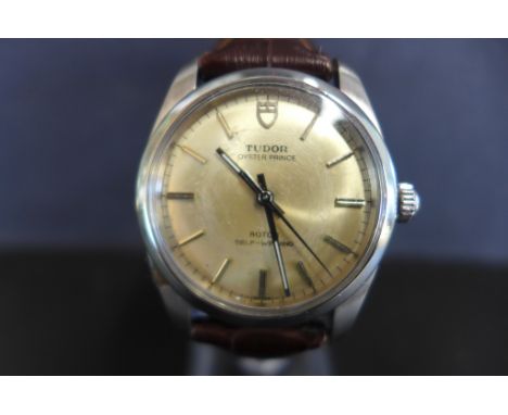A Tudor Oyster Prince stainless steel gents automatic wristwatch 36mm wide including button, in good condition, keeping good 