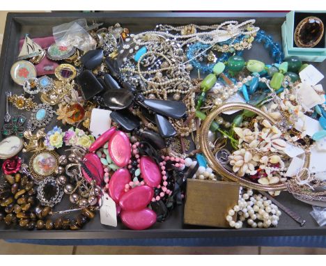 A collection of costume jewellery, necklaces, rings, brooches, see images for details 