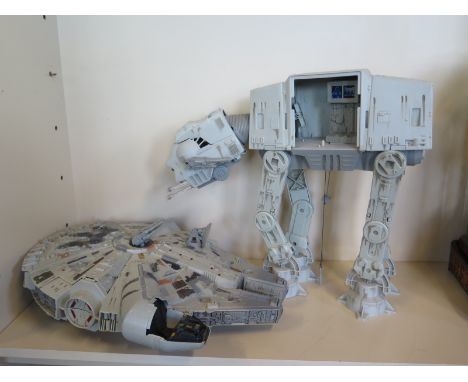 A Star Wars Tonka toy 1995 - Millennium Falcon with box together with a 1997 Kenner AT-AT, models in good condition but play 