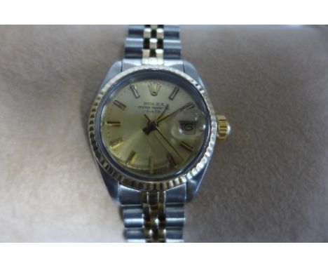 A ladies Rolex bi metal Oyster perpetual date bracelet wristwatch, 27mm wide including button, in good condition, running ord