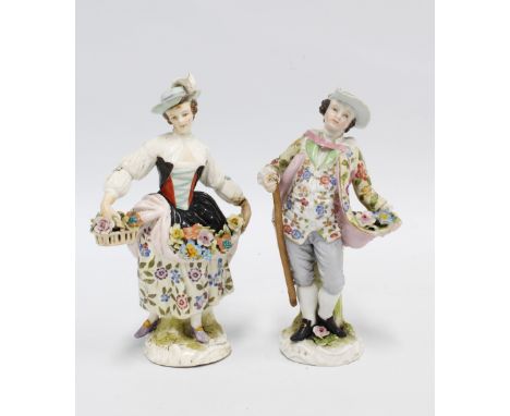 Two porcelain male and female flower seller figures, the girl with a blue anchor mark and the boy with a R backstamp, (2) 18c