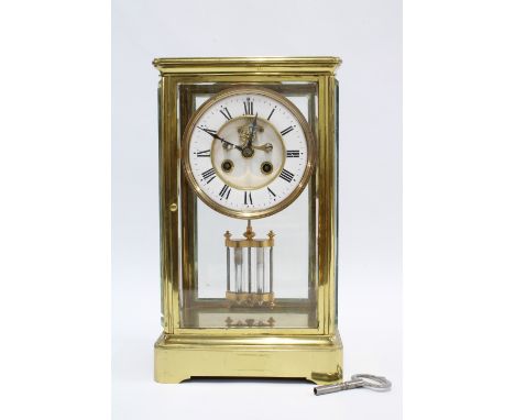 Brass and four glass panelled mantle clock, enamel chapter ring with Roman numerals, mercury pendulum and key, 30 x 18cm 
