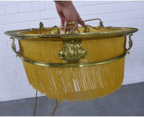 Brass rise and fall light fitting with fringed shade 