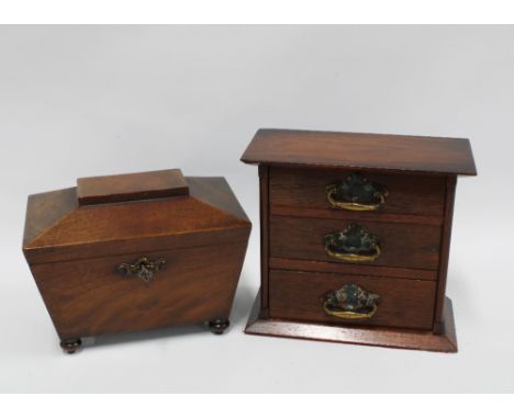 Mahogany sarcophagus tea caddy with two lead lined divisions, on bun feet, (one lacking) 22cm wide, together with a small mah