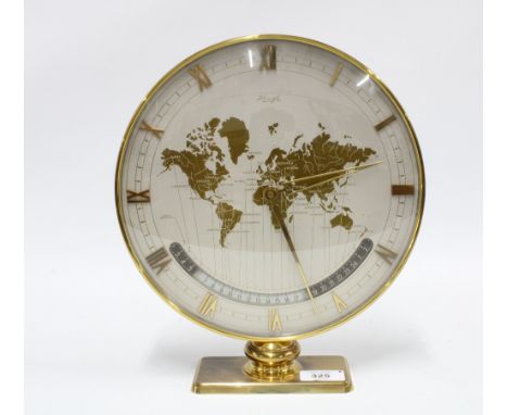 Kienzle brass framed mantle clock, the silvered dial with a map of the world, 30cm high 