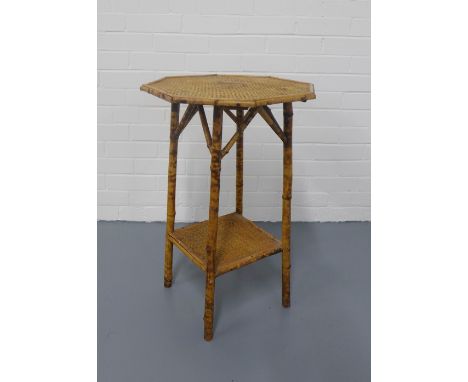 Vintage bamboo table, octagonal top with an undertier and splayed legs, 47 x 72cm. 