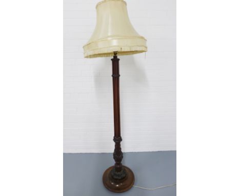 Mahogany standard lamp with carved details to the circular base, complete with shade 