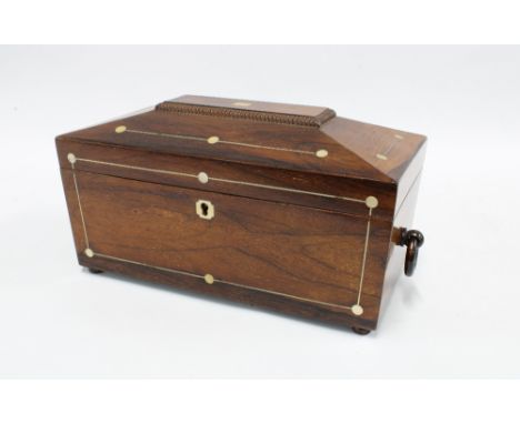 Large mahogany and mother of pearl inlaid tea caddy, sarcophagus form with two lined divisions, and a later glass mixing bowl