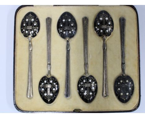 Cased set of six silver coffee spoons, the bowls decorated in black and white enamel, Birmingham 1938 (6) 