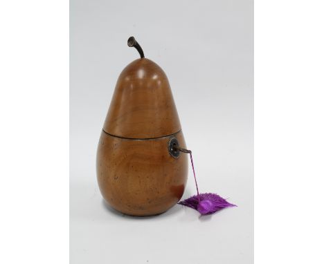 Fruitwood tea caddy in the form of a pear, complete with key, 21cm high 