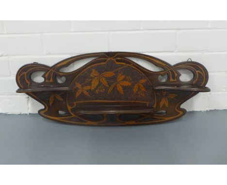 An Art Nouveau pokerwork wall shelf, 66 x 26cm. 