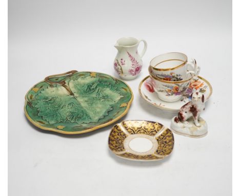 Continental porcelain: four putti ornaments, a Staffordshire dog, green leaf plate, a napkin ring  18th century jug etc (15)