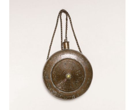 An Ottoman Empire copper water flask with incised decoration, 21cm high