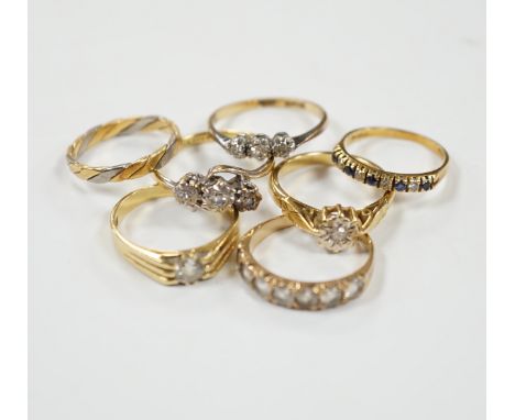 A 1920's 18ct gold and claw set solitaire diamond ring, size O, five other assorted 18ct gold and gem set rings including dia