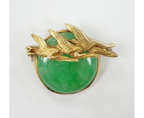 A Chinese? yellow metal mounted jade brooch, the mount with three birds, 29mm, gross weight 7.6 grams.