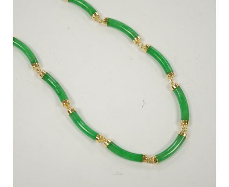 A 14k yellow metal and curved jade link necklace, 42cm, gross weight 25 grams.