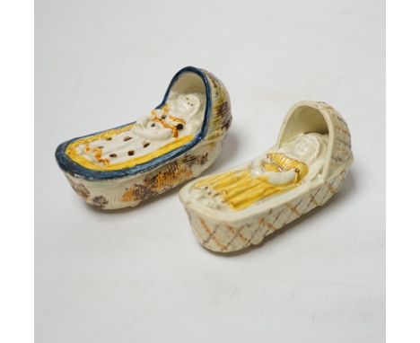 Two late 18th century Prattware ‘crib’ models of cradles, 10cm long