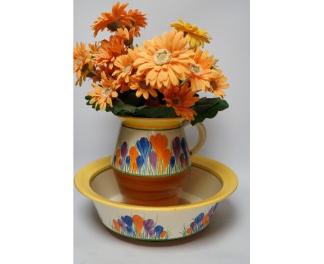 A Clarice Cliff  Crocus pattern jug and basin, chamber pot and teapot with cover missing, basin 37cm diameter