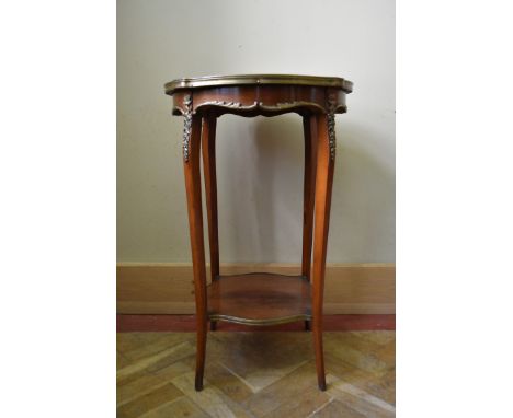 A 19th century Louis XV style walnut lamp table or urn stand with shaped brass bound marble top on slender cabriole supports 