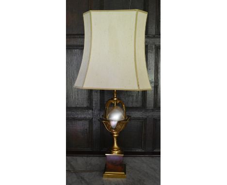 A brass and metal table lamp on a Classical style socle base. H.84cm W.40cm 