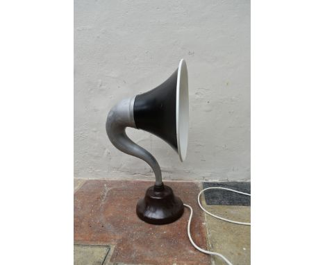 A table lamp converted from a 1920's gramaphone speaker in aluminium and bakelite. H.62cm 