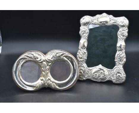 An embossed silver framed easel picture frame, Birmingham 1897 and a late 19th century silver twin picture frame, English hal