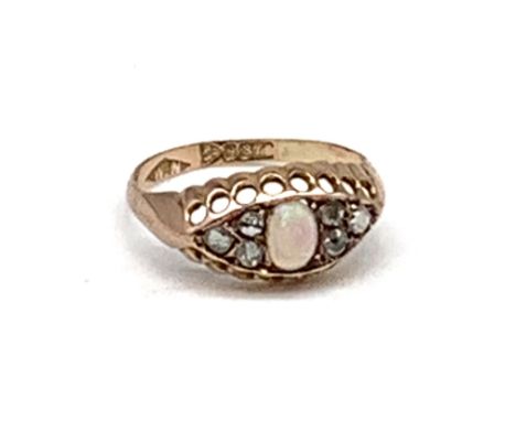 A 9ct yellow gold diamond and opal ring, Chester hallmark, date letter obscured, approx 1.2g.Additional InformationRing size 