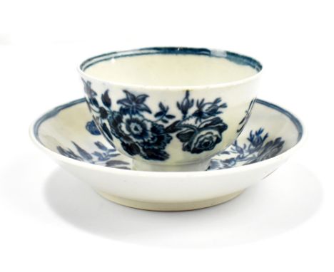 WORCESTER; a first period tea bowl and saucer painted in the 'Mansfield' pattern, saucer with crescent moon mark to base, dia
