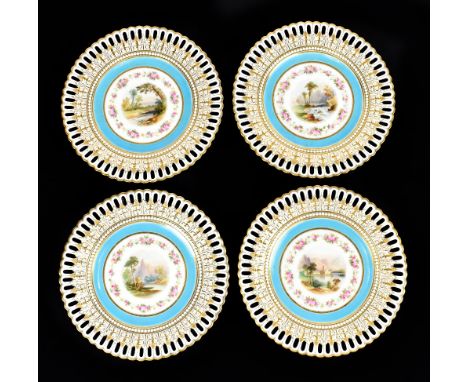 MINTON; a set of four cabinet plates with gilt heightened pierced rims and central circular landscape vignettes, probably pai