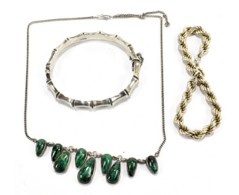 Two bracelets comprising a hallmarked silver bamboo snap bangle and a silver plated rope twist bracelet, also a malachite nec