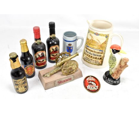 A collection of advertising and brewery related items to include Bulmers Cider ceramic figure modelled as a woodpecker, heigh