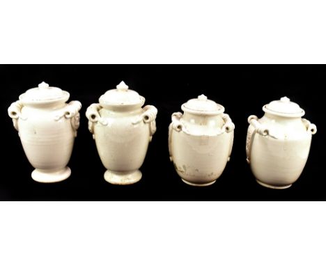 A pair of Italian white crackle glazed ceramic lidded jars, height 27cm, and another pair of jars, height 26cm (4).