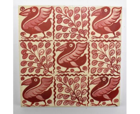 WILLIAM DE MORGAN; a rare lustre glazed square sectioned tile decorated with alternate panels of pelicans and foliage, 15 x 1
