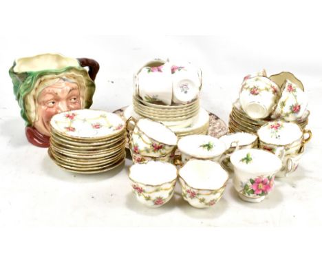 A mixed group of ceramic teaware including Royal Albert 'Prairie Rose' pattern, also a Beswick 'Sairey Gamp' character jug.