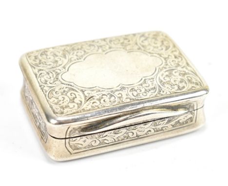 A late Victorian hallmarked silver snuff box of rounded rectangular form, with foliate scroll engraved detail throughout and 