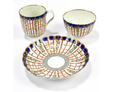WORCESTER; an 18th century first period trio decorated in the 'Hop Trellis' pattern with royal blue border and gold dentil ed