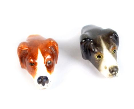 ROYAL WORCESTER; two hounds head whistles, both with printed marks, one with original box, length 3.7cm (2).