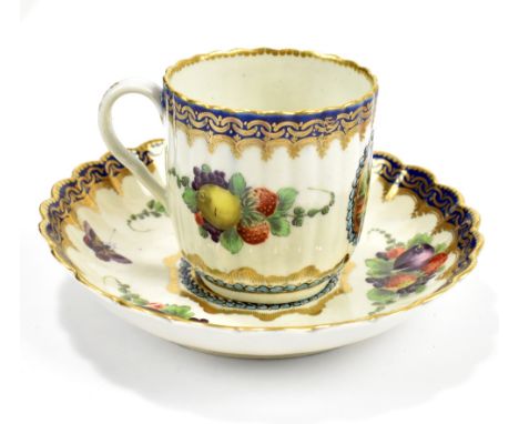 WORCESTER; an 18th century first period tea bowl and saucer, decorated in the 'Lord Henry Thyme' pattern and painted with lan