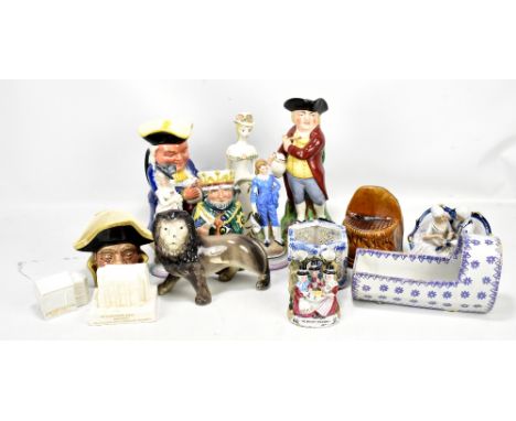 A group of ceramic figures including a Beswick character jug, a Staffordshire 'Earl Order of St Patrick', 'The Welsh Tea Part