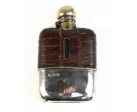 A George V hallmarked silver and part crocodile skin hip flask, with twist action lid, Sheffield 1917, height approx 13cm.Add