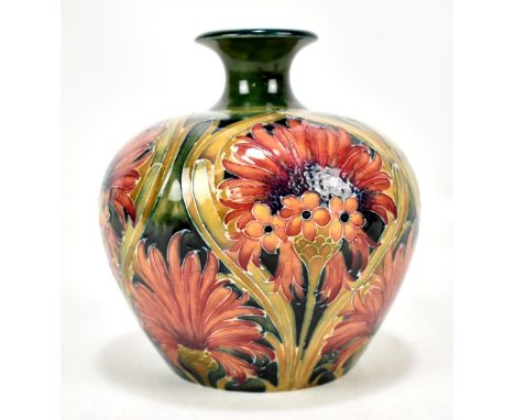 WILLIAM MOORCROFT FOR JAMES MACINTYRE &amp; CO; a squat vase with flared neck decorated in the cornflower pattern, green sign