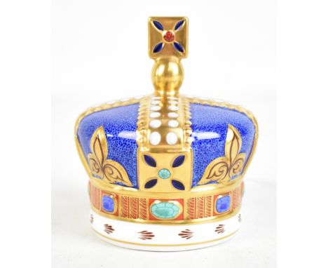 ROYAL CROWN DERBY; a boxed limited edition One Hundred Royal Years paperweight, with gold plug and limited to an edition of 1