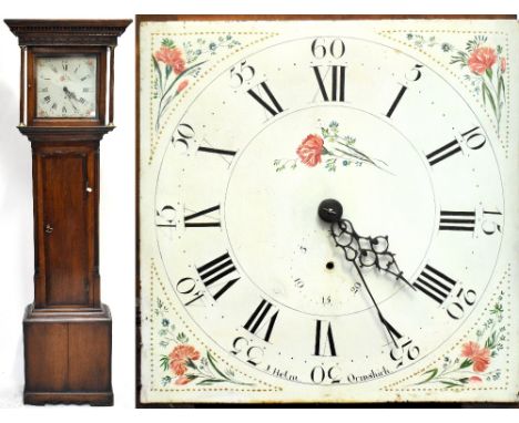 AJ HELM OF ORMSKIRK; an oak cased longcase clock, the painted dial set with Roman numerals and subsidiary date dial (finger m