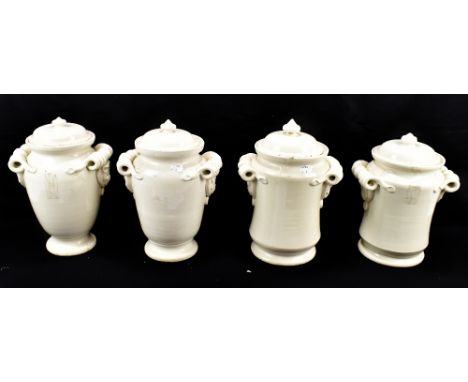 A pair of Italian white crackle glazed ceramic lidded jars, height 27cm, and another pair of lidded jars, height 28cm (4).