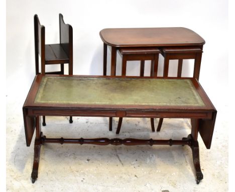 A reproduction mahogany veneered drop leaf sofa table, mahogany nest of coffee tables and a 1920s/30s oak magazine rack (3).